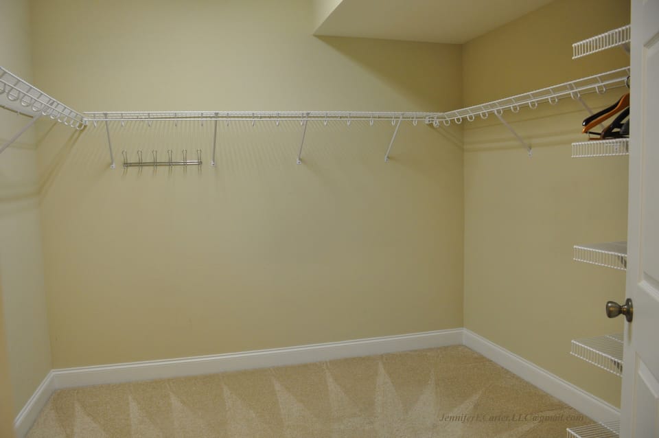 Master bedroom walk-in closet.  Big enough for King air mattress or pack/play.
