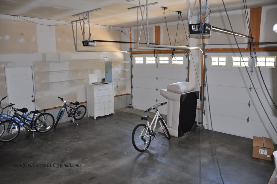 2 car garage; Bikes, Refrigerator/Freezer
