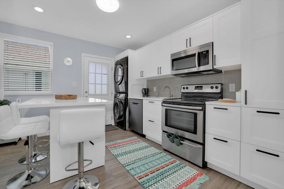 Well organized kitchen to show off your culinary skills.