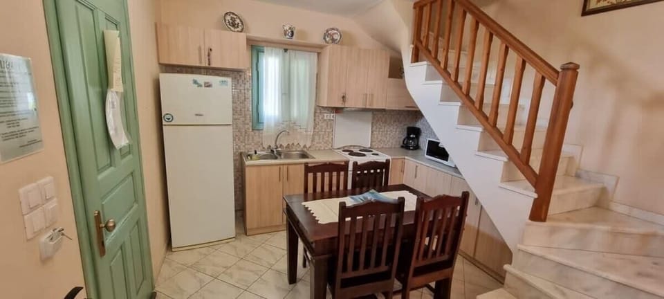 Second Kitchen View – Open to the Dining Area
Angle showing connection between kitchen and shared space.