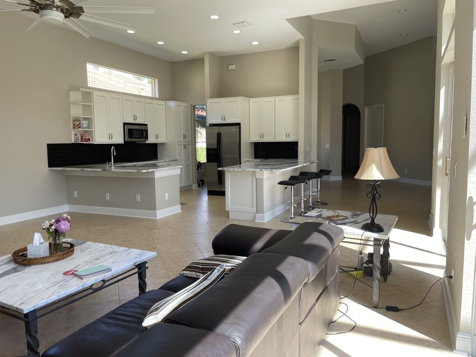 Gathering room looking toward open kitchen area 