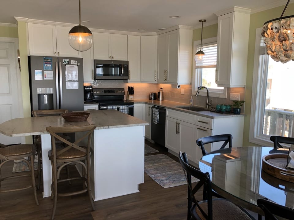 Our kitchen comes well-stocked with oils, spices, condiments, and paper goods.