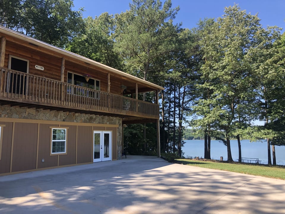 Unwind on Cherokee! Level yard access to the dock and lake. 
