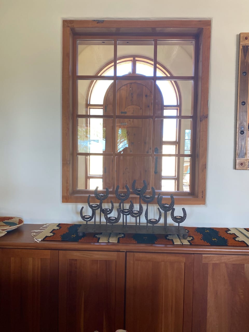 Living room window to front entry