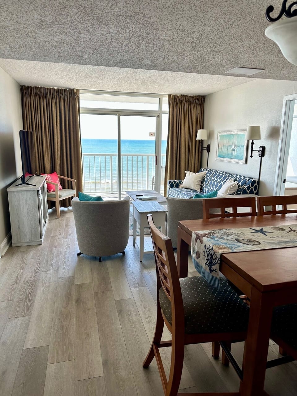 View from entry way looking towards family room and balcony door
