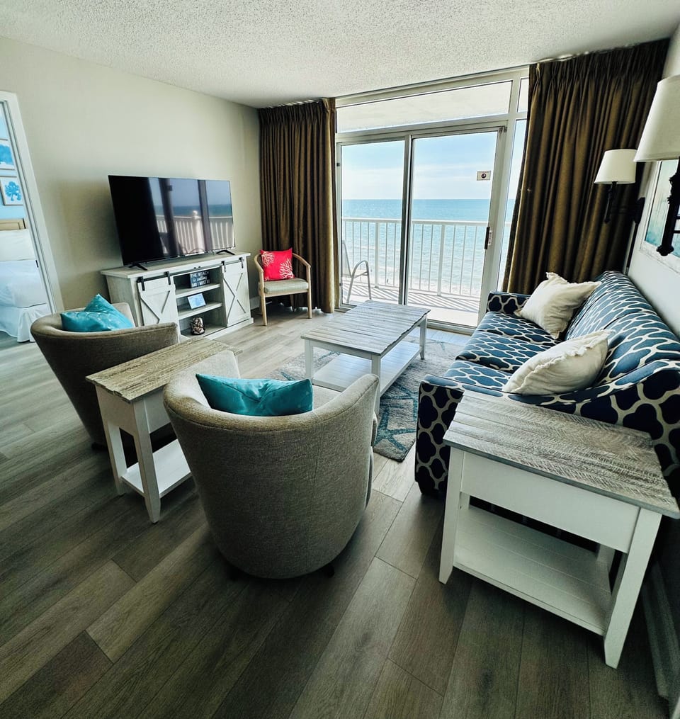 Family room with sliding doors to balcony