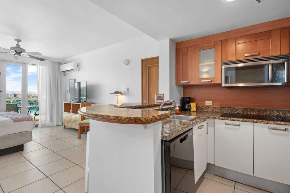 The studio offers a king bed, table for 2, a fully equipped and stocked kitchen and a balcony overlooking the Condado Lagoon.
