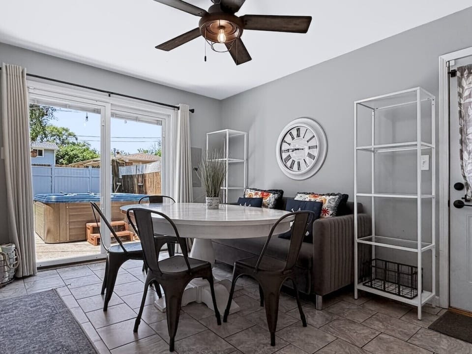 Dining area with direct access to the backyard and private hot tub.