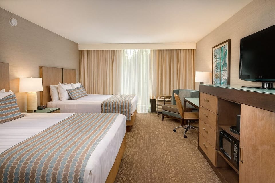 Relax into crisp linens with plenty of space to unwind.