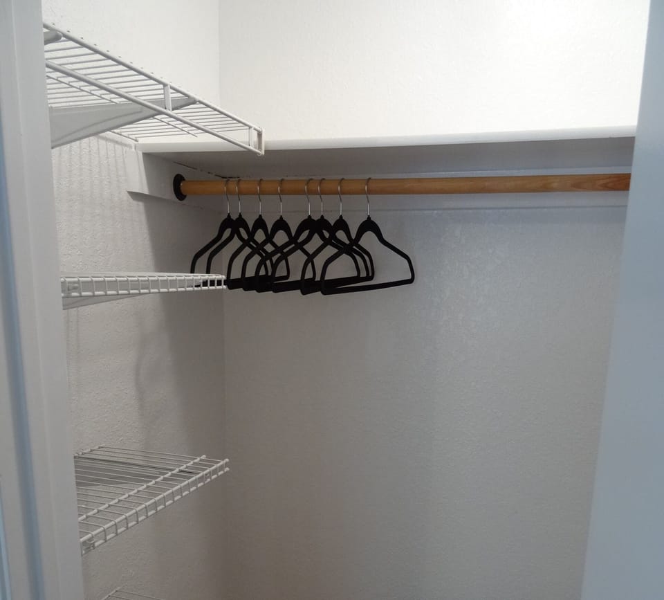 Walk-in closet in The Corral bedroom