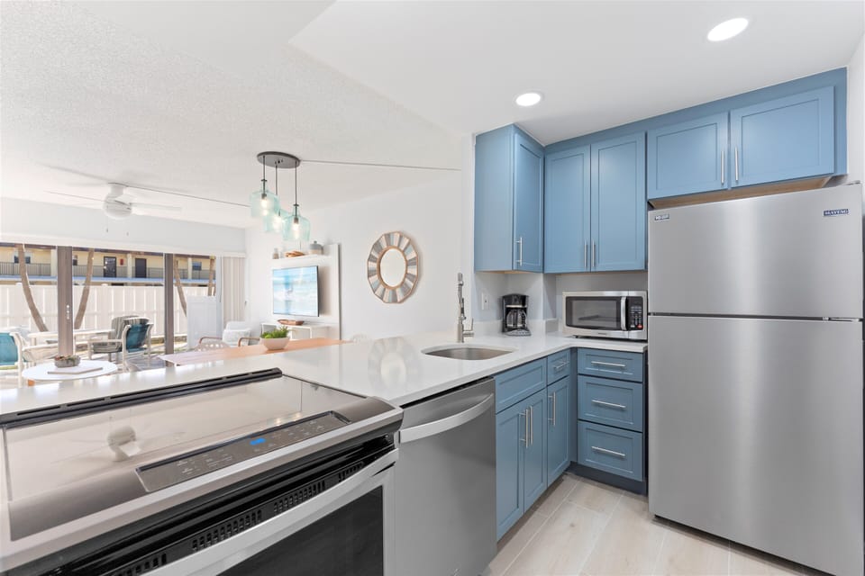 Fully equipped kitchen with stainless appliances