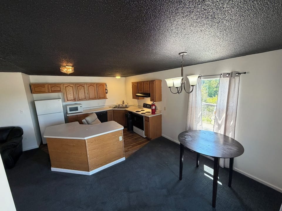 Kitchen; Downstairs, Chair out of place.