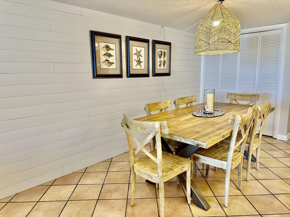 Behind those bifold doors is the washer and dryer.