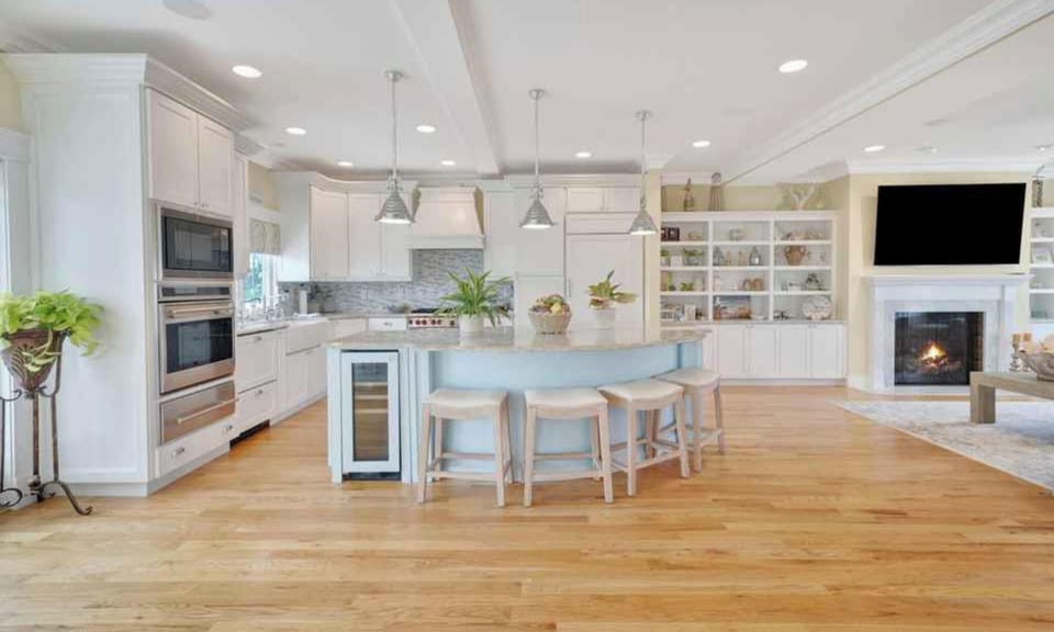 Huge island and open floor plan in kitchen, dining area and entertaining space. 