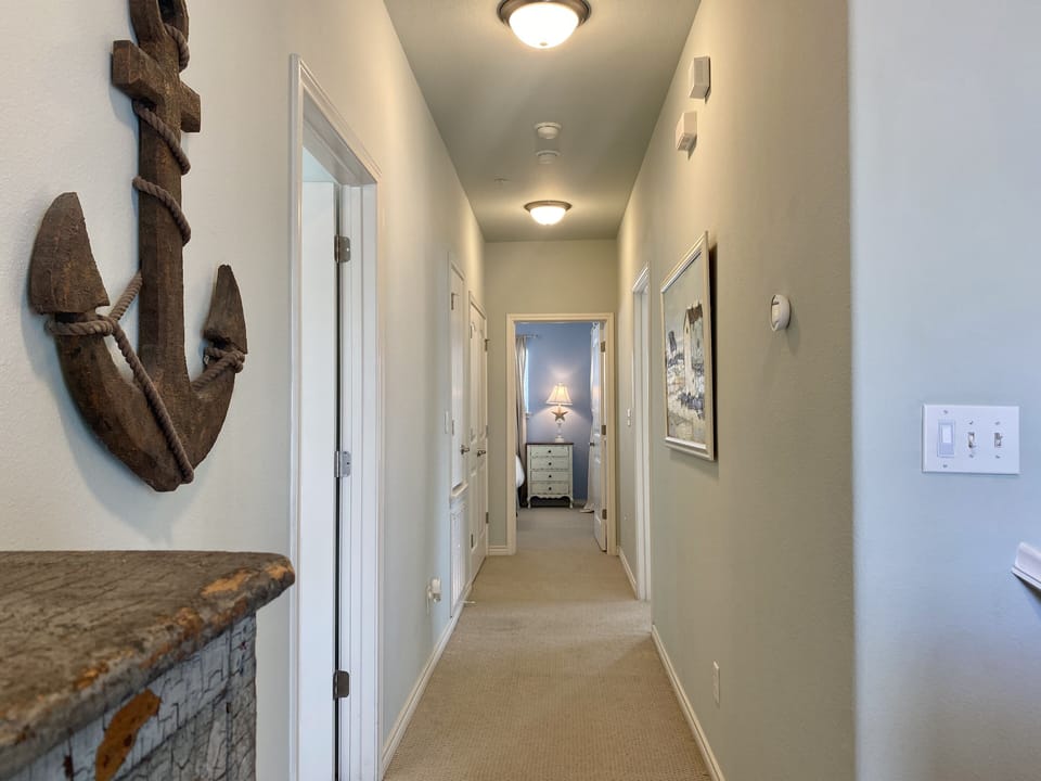 Upstair hallway leading to the bedrooms and laundry