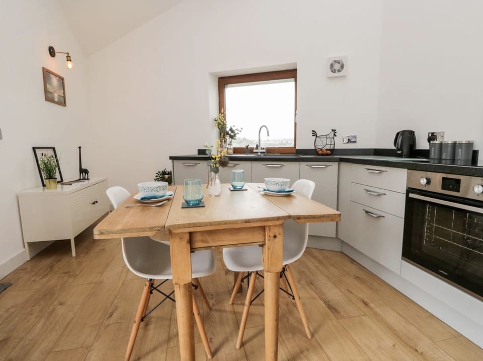 Open plan kitchen and dining with beautiful views out towards Arnside 