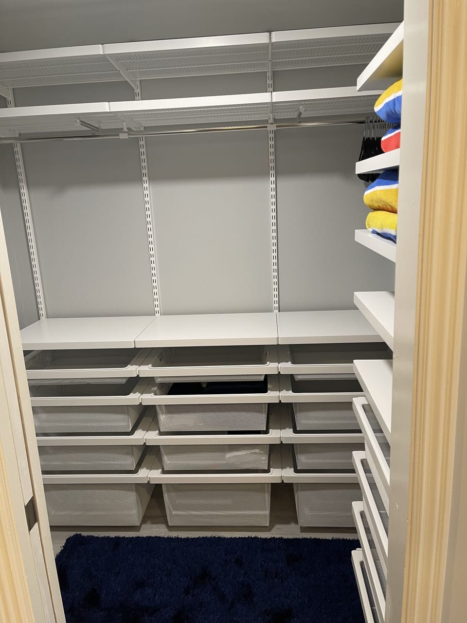 Primary walk-in closet.