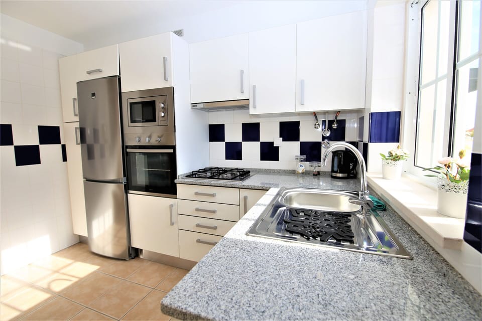 Another view of kitchen with all the appliances necessary for your holiday