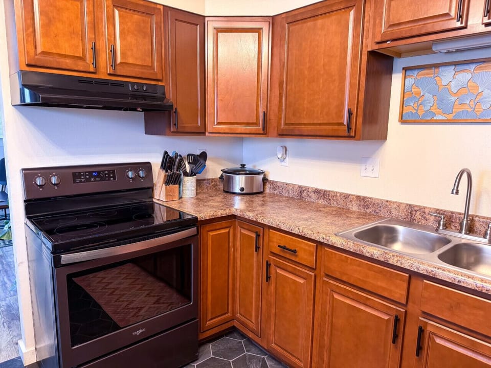 Fully stocked kitchen with small appliances and everything you need to cook at home.