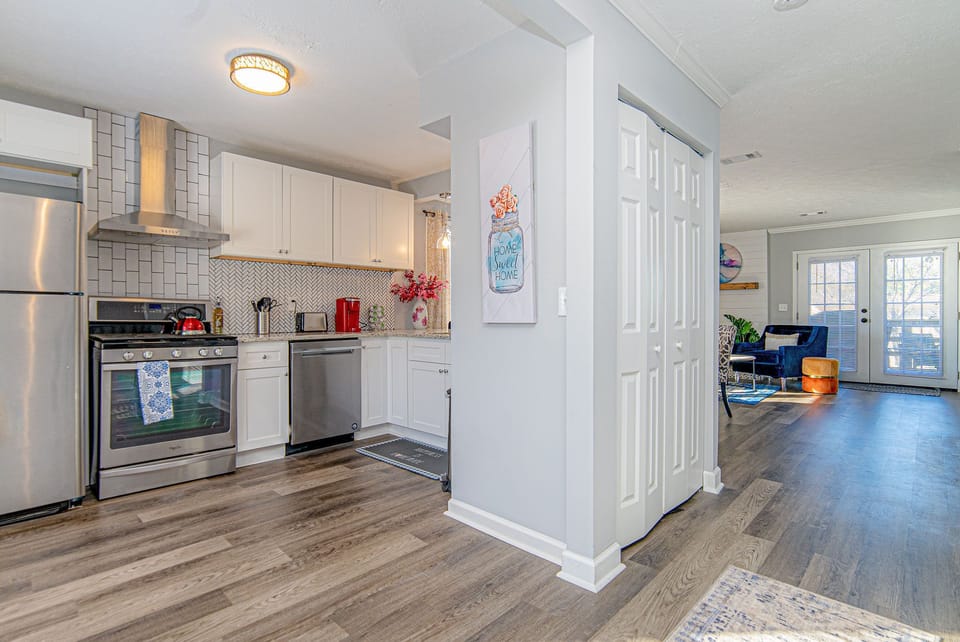 View of the kitchen and living room from the front door