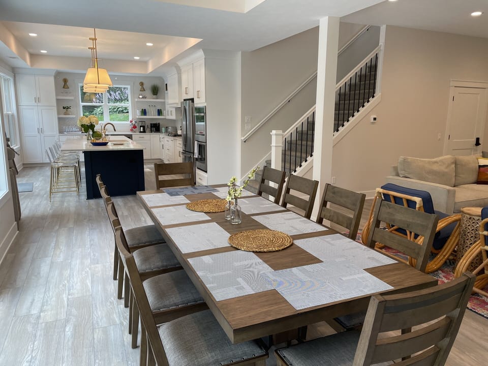 Open floor plan with kitchen and dining room connected to the patio 