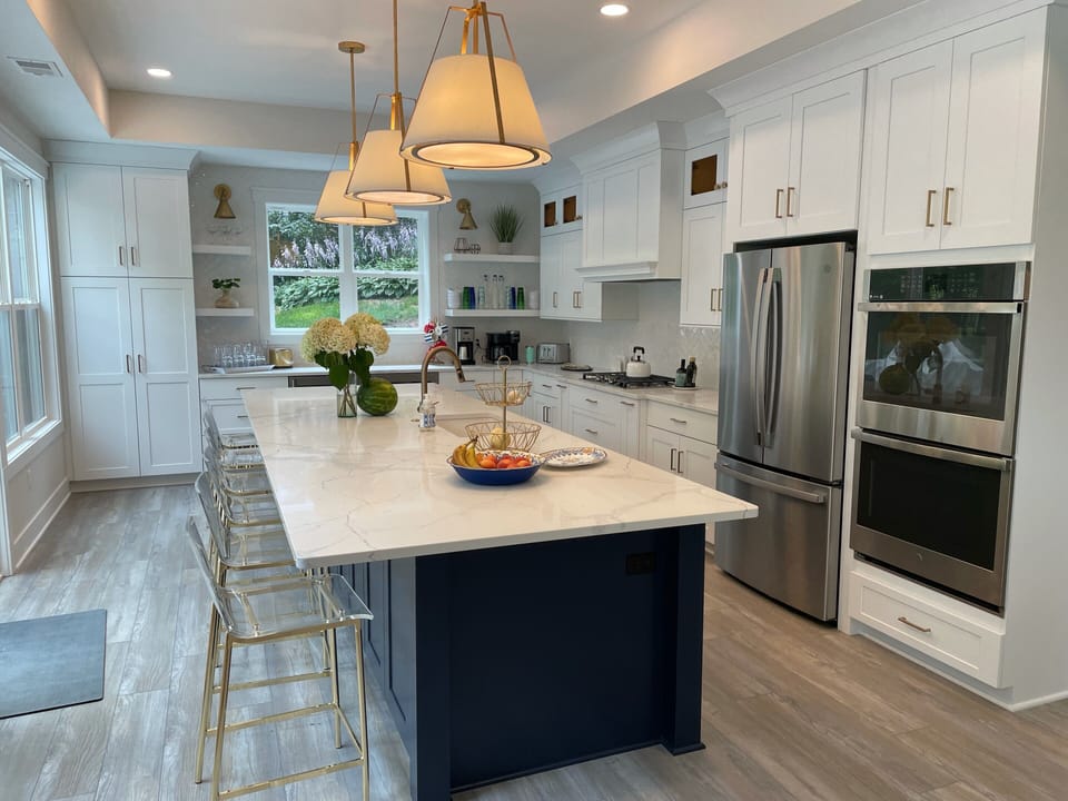 Kitchen right off the patio with gas grill outside 