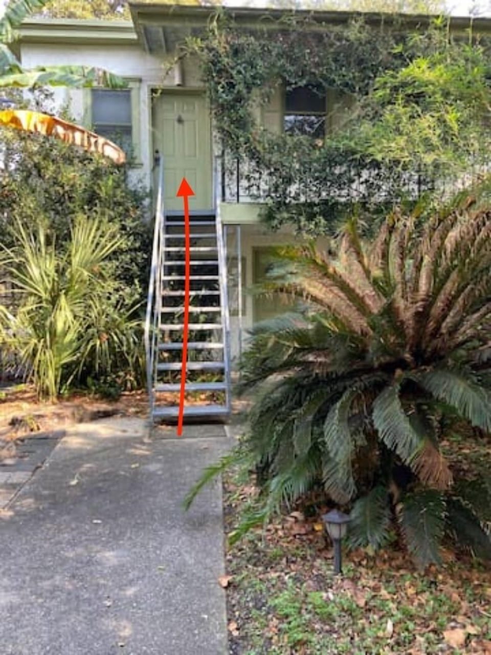 Your unit is the upstairs unit. Continue up the stairs and enter the door code.