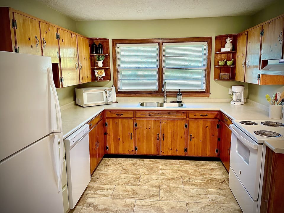 Brand new full-size appliances; Ample counter space; Fully stocked kitchen