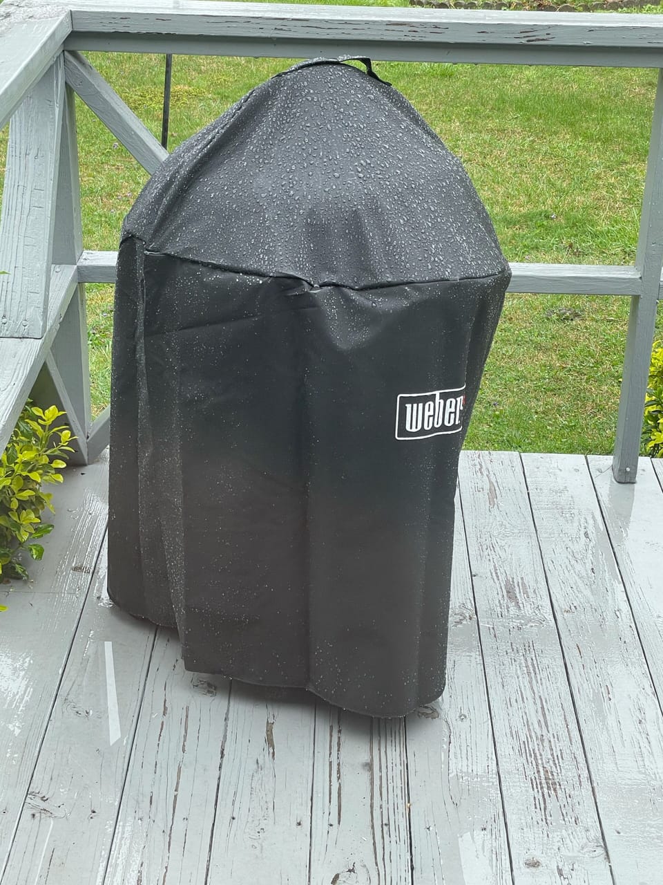 Weber charcoal grill on back deck; Relax in Adirondack chairs (not pictured)
