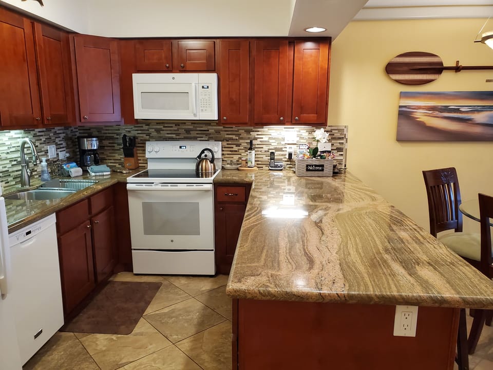Full-sized kitchen with plenty of workspace and storage.