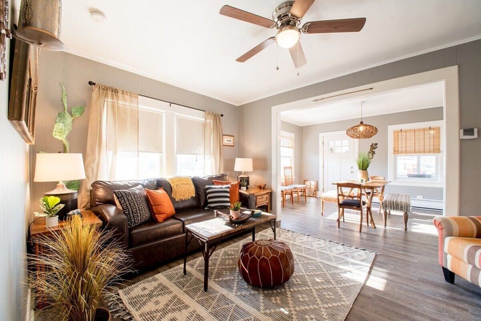 Open concept living and dining area (new sofa since pic)