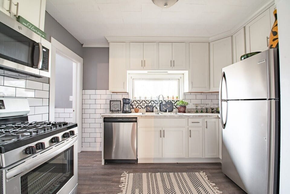 Fully stocked kitchen. Gas range, dishwasher, refrigerator, microwave, toaster and blender provided