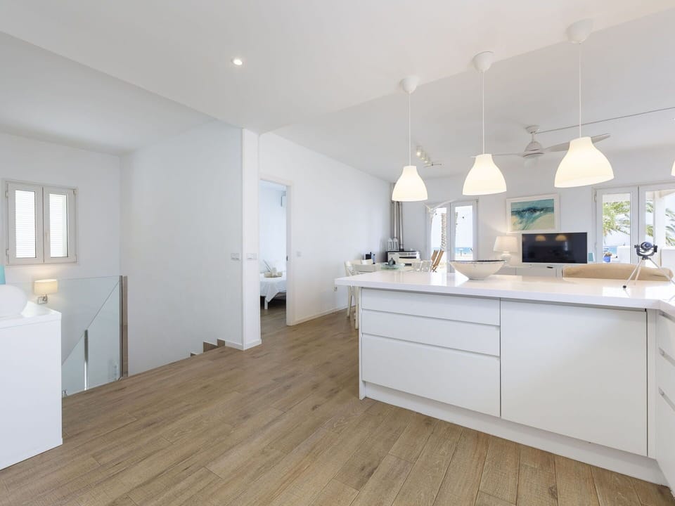 Interior Design, Furniture, Flooring, Floor, Countertop, Wood Flooring, Kitchen, Wood, Ceiling, Cabinetry