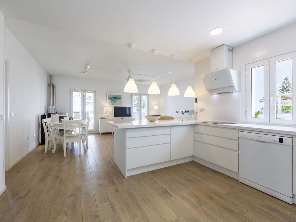 Interior Design, Furniture, Flooring, Kitchen, Floor, Countertop, Wood Flooring, Light Fixture, Wood, Ceiling