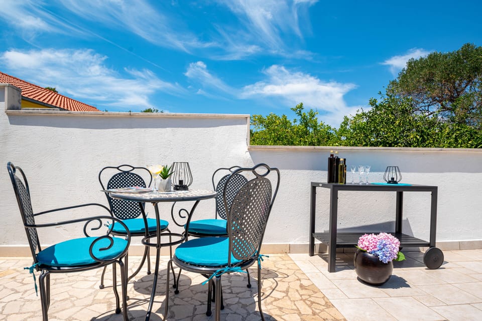 Shared terrace with seating area. 