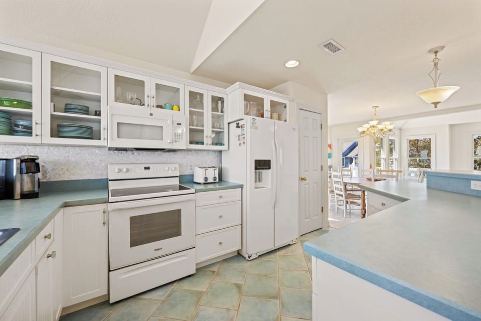 Large Kitchen with Bar Seating on Second Level