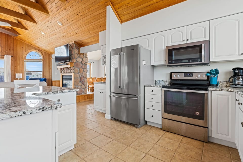 Kitchen with Stainless Steel Appliances on Third Level