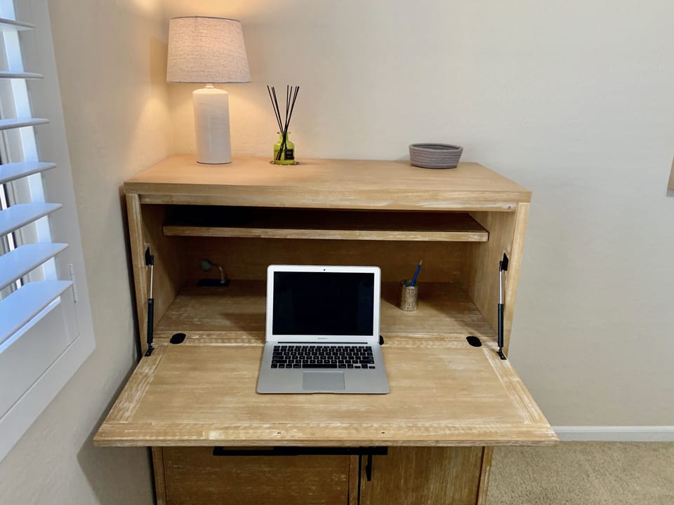 Workstation in each bedroom with USB port and power. Chairs available in closet.
