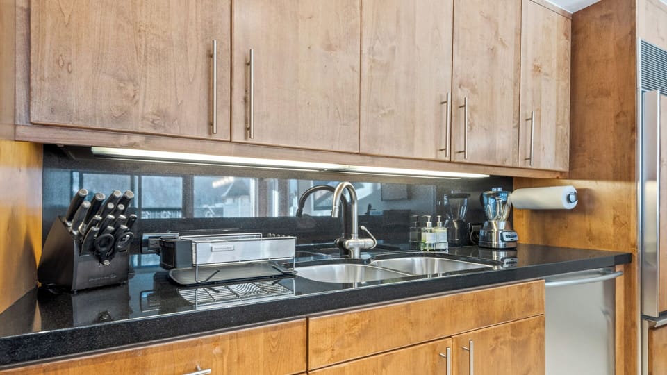 Your fully equipped kitchen features modern appliances and ample counter space, making meal prep a breeze during your stay.
