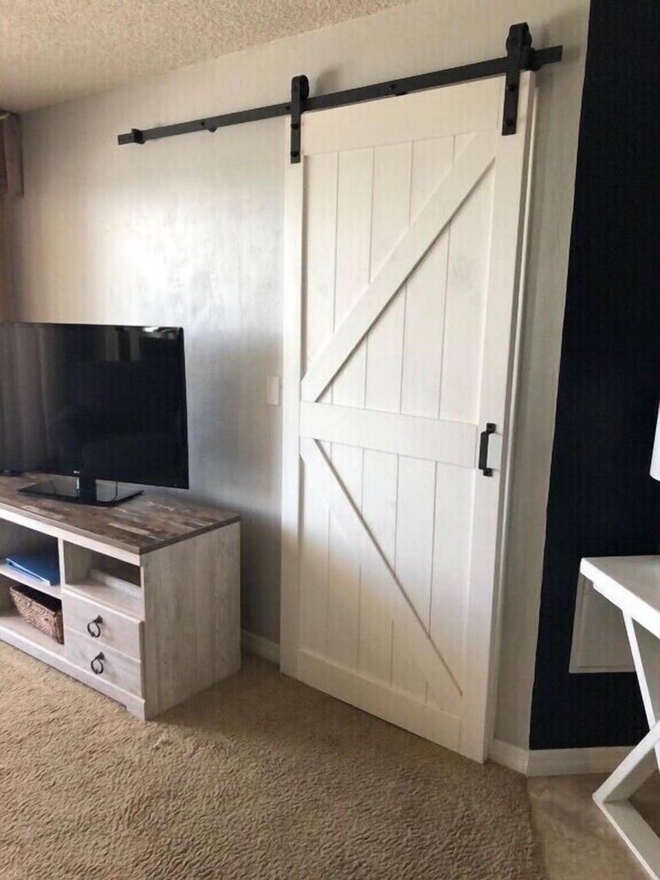 The new chic barn door is lovely.