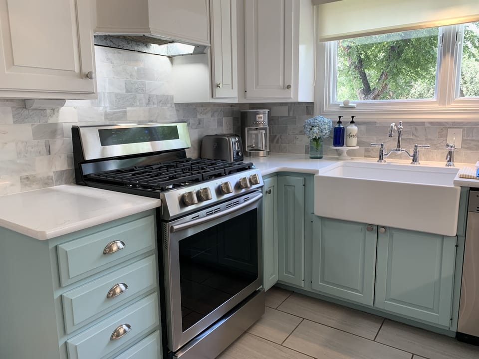Fully stocked immaculate kitchen. Pots, pans, cookware, plates, cups, etc