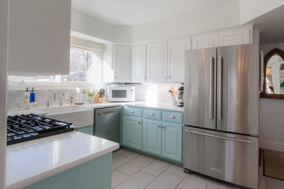 Full size refrigerator, toaster, Kitchen Aid mixer, microwave, tin foil, etc.