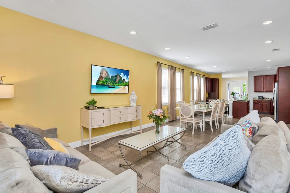 Spacious and stylish, this area encourages group gatherings with multiple couches and entertainment options.