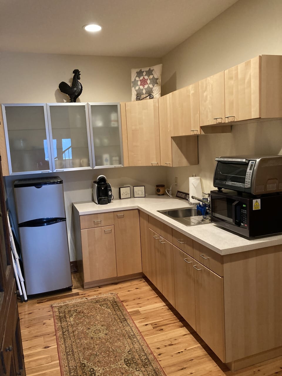Kitchenette, small refrigerator, microwave, toaster oven, pod coffee maker