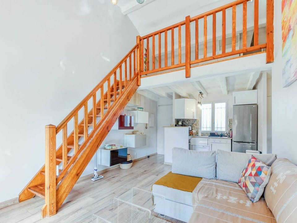 Couch, Building, Orange, Wood, Shelving, Interior Design, Bookcase, Flooring, Floor, Living Room
