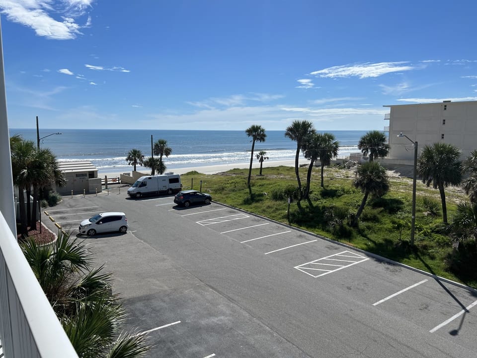 Beachfront Bliss: Wake up to breathtaking views from our oceanfront condo.