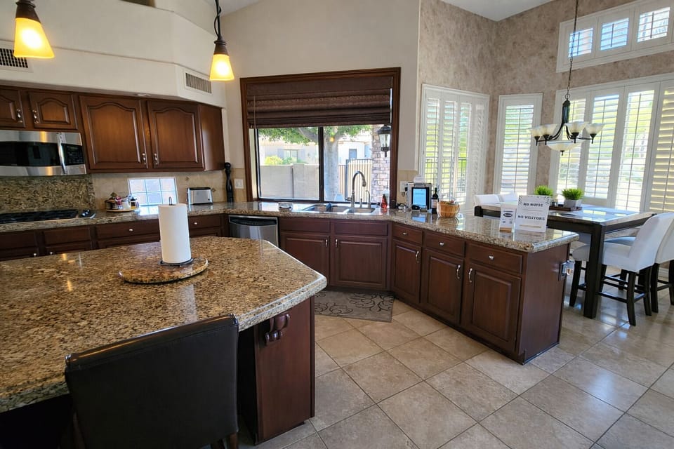 The spacious kitchen is fully stocked and has plenty of preparation space.