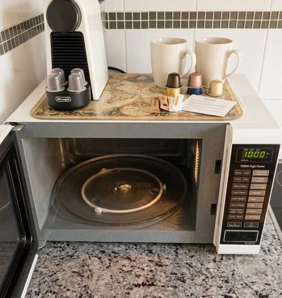 Coffee, made easy ☕
Pod machine, and a microwave for quick bites anytime.