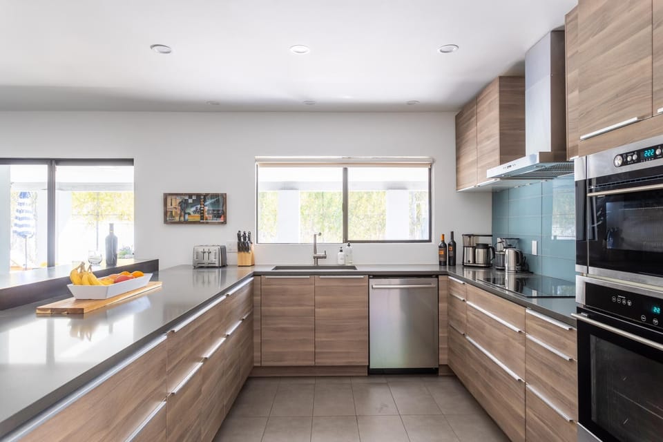 Modern and sleek Chef's kitchen.