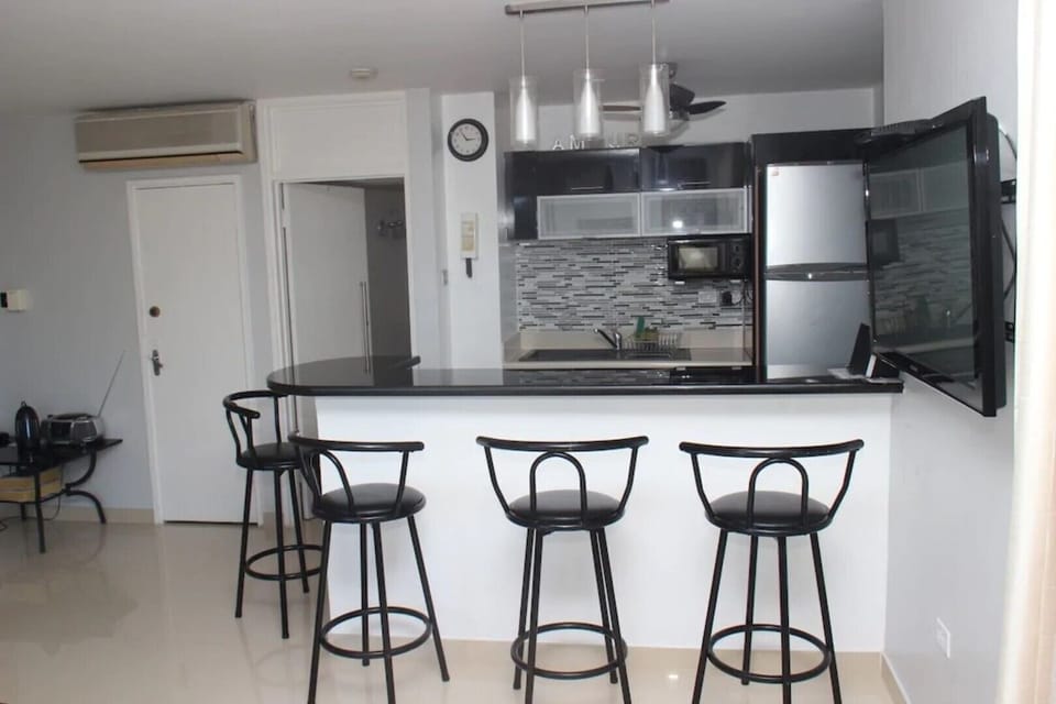 Breakfast bar..the door behind leads to the master bedroom with the en-suite